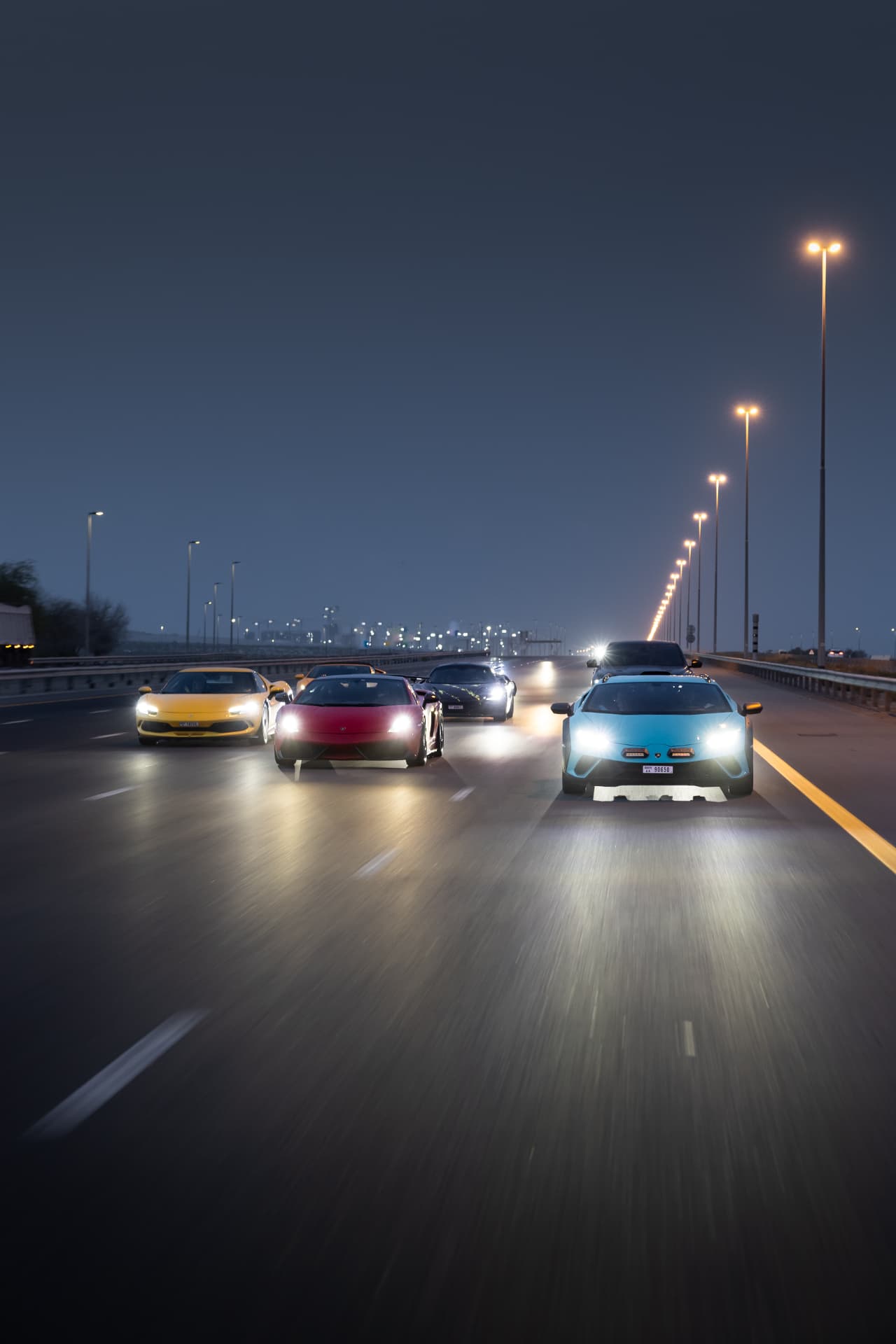 Supercar on Sheikh Zayed Road at dusk